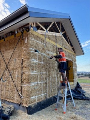 Render on straw bale